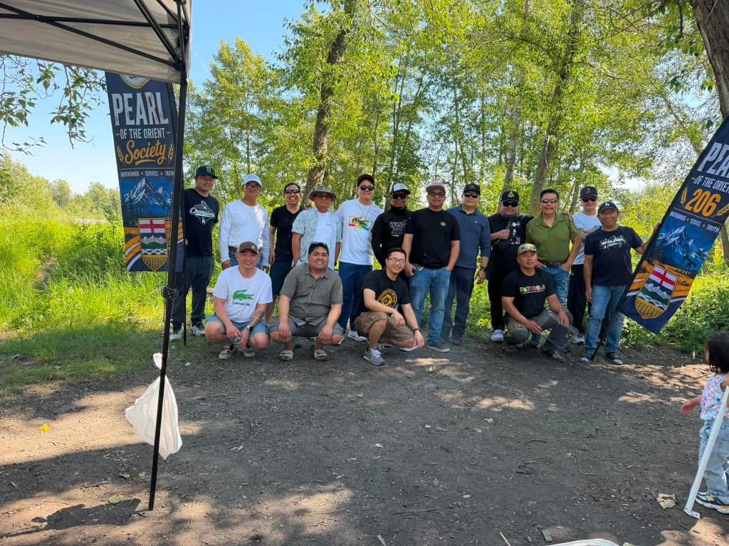 Members of Pearl of the Orient Lodge No. 206 gathered outdoors at the 2026 family picnic.