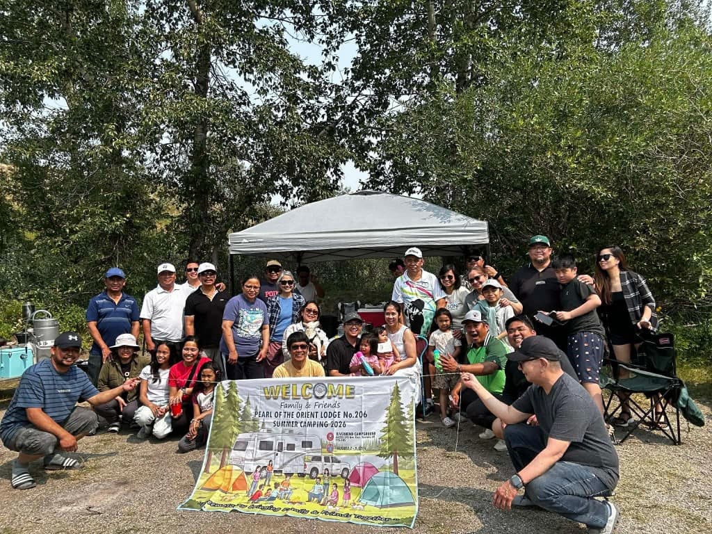 Family and friends of Pearl of the Orient Lodge No. 206 gathered for a group photograph at the 2026 summer camping.